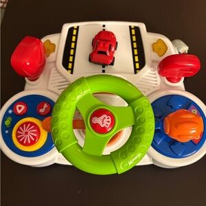 Interactive Steering Wheel Toy with Red and Green Accents